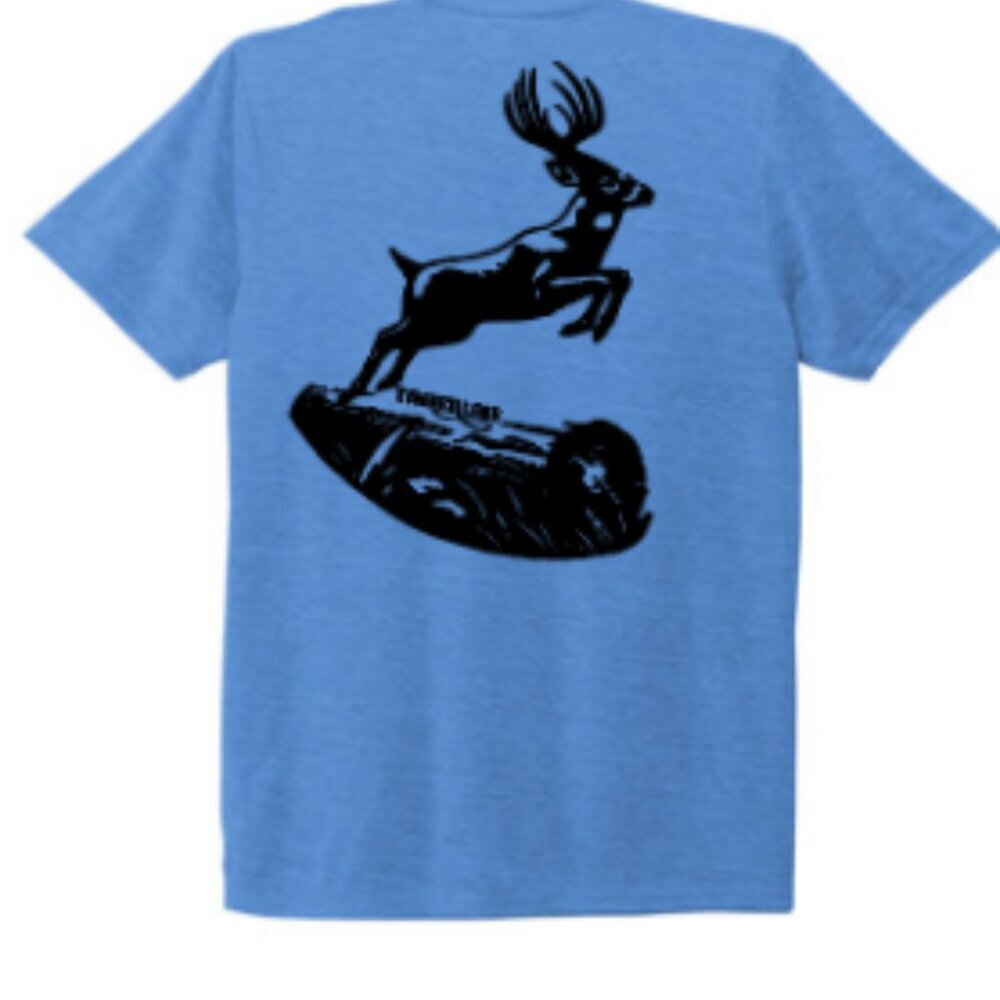 Deer jumping over log